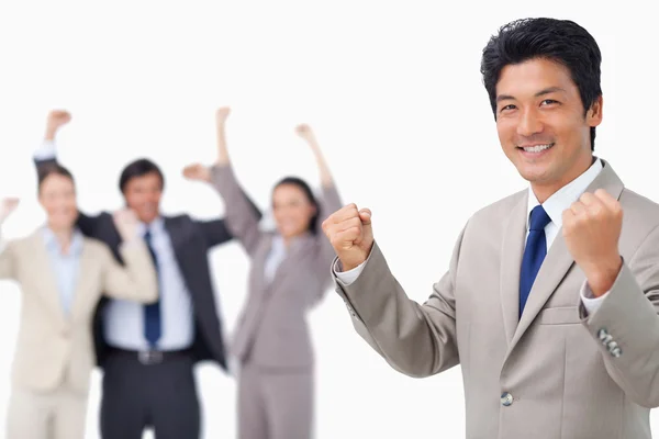 Successful businessman getting celebrated by colleagues — Stock Photo, Image