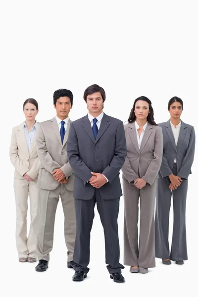 Businessman standing with his team — Stock Photo, Image