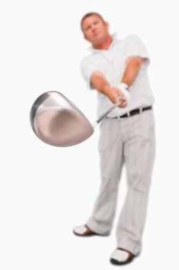 Golf club being used clipart