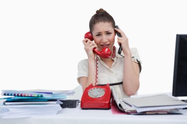 Stressed secretary answering the phones clipart