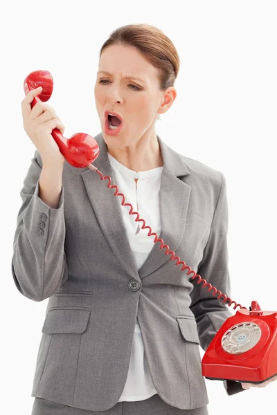 Businesswoman shouts down the phone — Stock Photo, Image