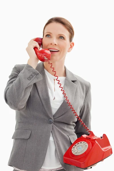 Emocionada mujer de negocios hablando por teléfono — Foto de Stock