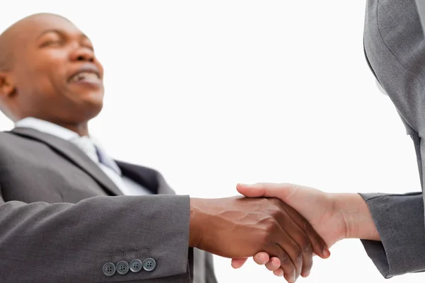 Businessman shakes hand — Stock Photo, Image