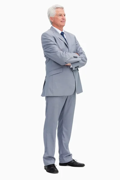 Man in a suit with folded arms — Stock Photo, Image