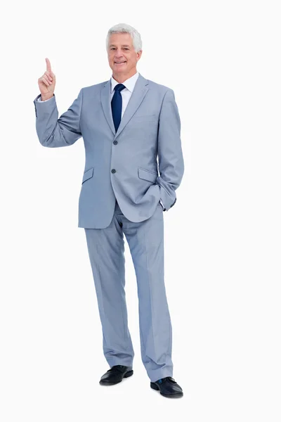 Portret van een zakenman die omhoog wijst — Stockfoto