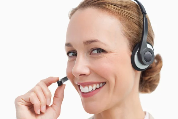Retrato de una mujer de negocios hablando con un auricular —  Fotos de Stock