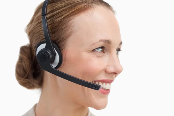 Profile of a businesswoman with a headset — Stock Photo, Image