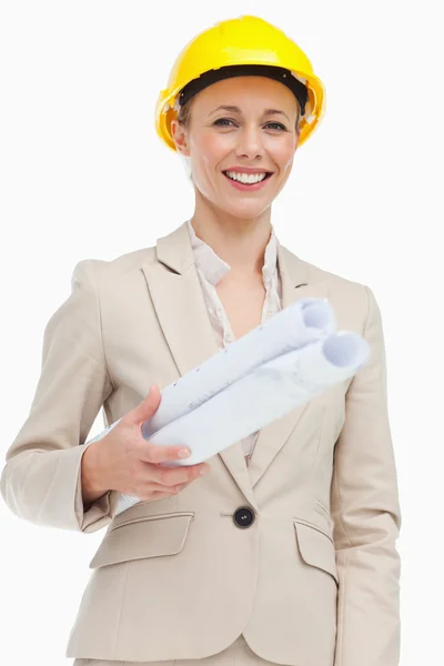 Portrait of a woman in a suit wearing a safety helmet — Stock Photo, Image