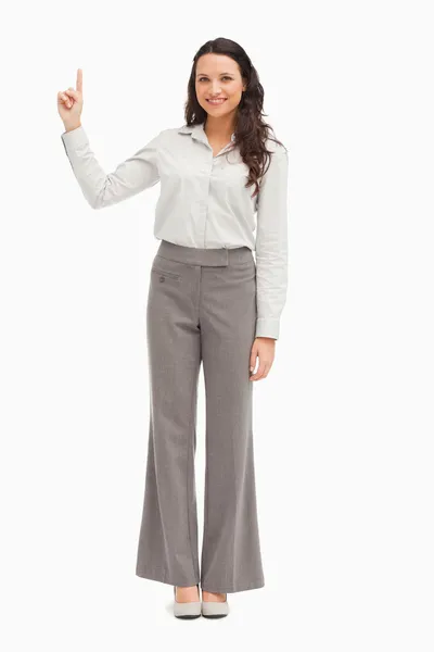 Portrait of an employee pointing up — Stock Photo, Image