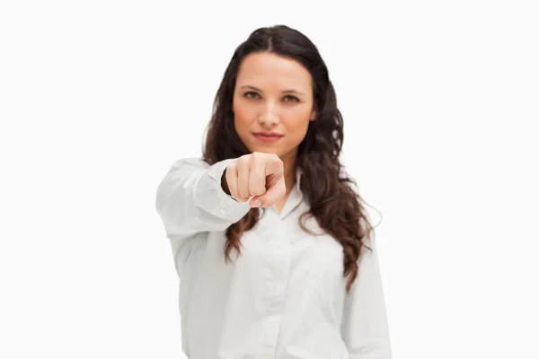 Portrait of a brunette pointing — Stock Photo, Image