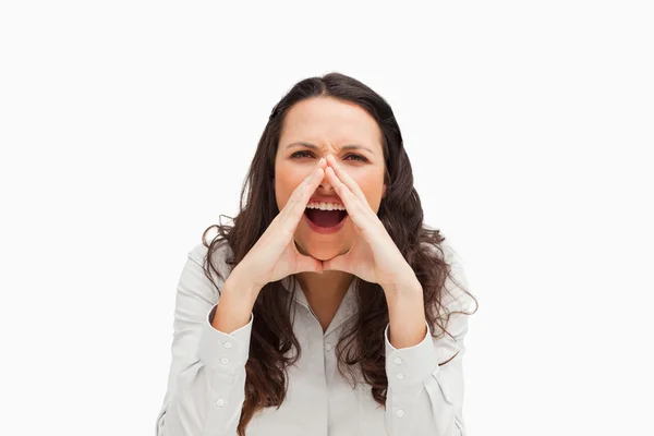 Portrait of a brunette yelling with hands — Stock Photo, Image