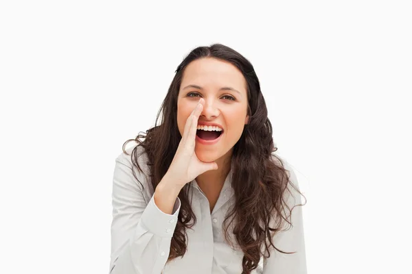 Portrait of a brunette calling with hands — Stock Photo, Image