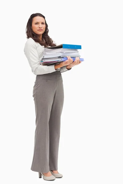 Woman carrying a lot of files — Stock Photo, Image