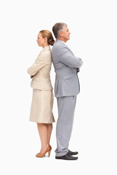 Business with folded arms back to back — Stock Photo, Image
