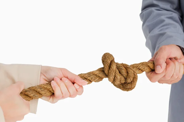 Business tightening a knot — Stock Photo, Image