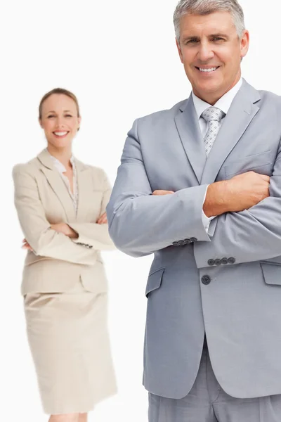 Cheerful business with folded arms — Stock Photo, Image