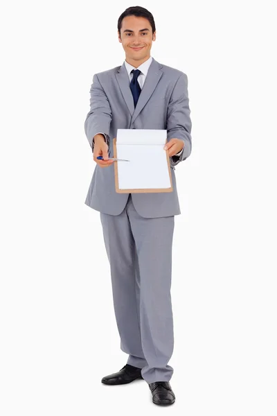 Portrait of a good-looking man showing a file — Stock Photo, Image
