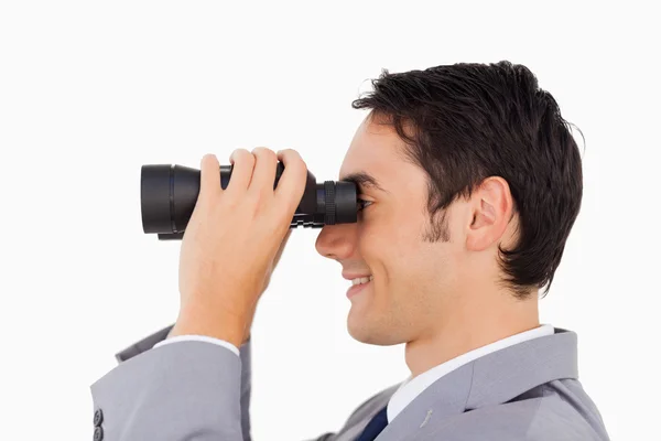 Närbild av en affärsman med kikare — Stockfoto