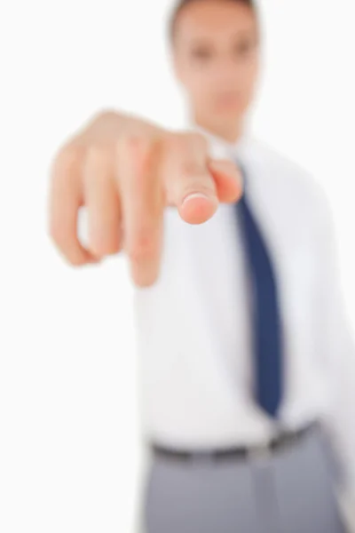 Close-up of a man pointing in front of him — Stock Photo, Image