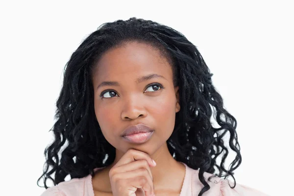 Head shot of a young woman who is thinking — Stock Photo, Image