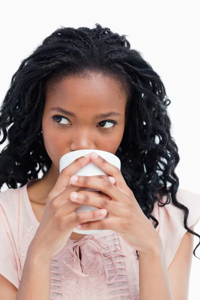 Close up of a woman drinking out of a cup — Stock Photo, Image