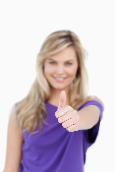 Thumbs up being placed by a blonde woman — Stock Photo, Image