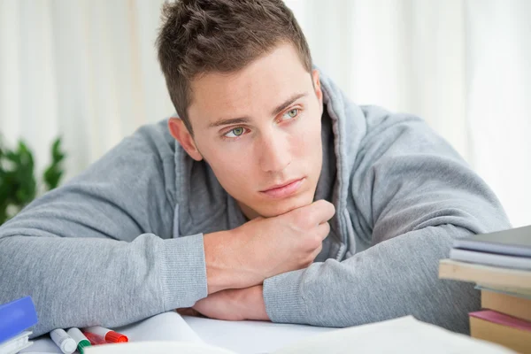 Student at his desk — Stock Photo, Image