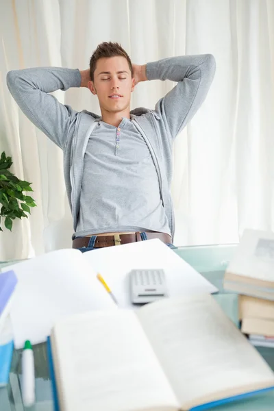 Student stretching with closed eyes — Stock Photo, Image