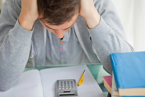 Student tearing while doing math — Stock Photo, Image
