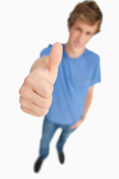 Fisheye view of a male student thumb-up — Stock Photo, Image