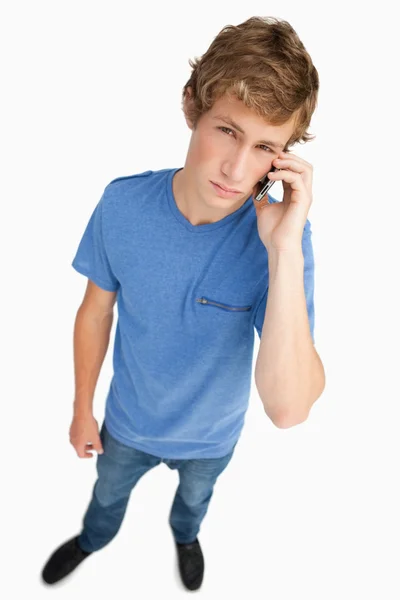 Fisheye view of a young man calling — Stock Photo, Image