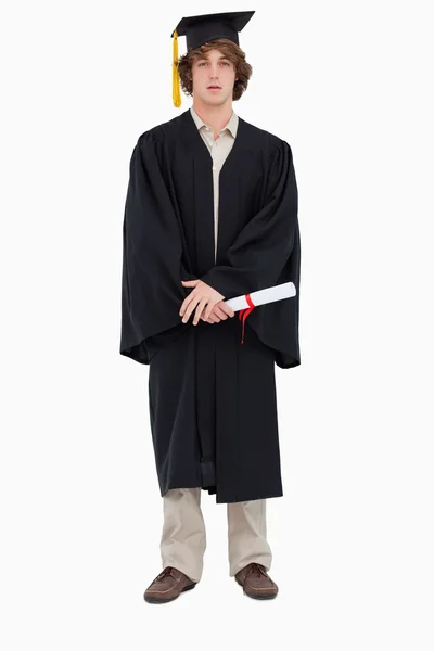 Student i graduate robe — Stockfoto
