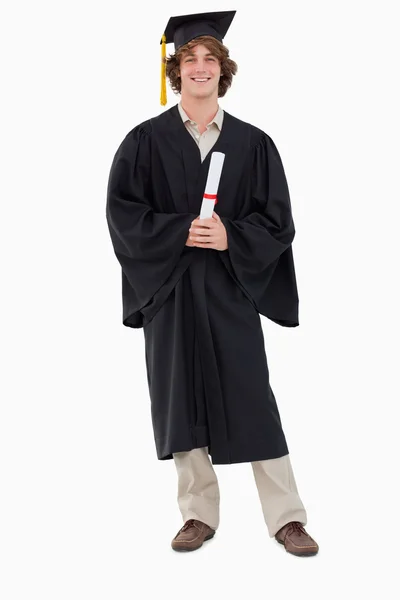 Uśmiechający się student absolwent szaty — Zdjęcie stockowe