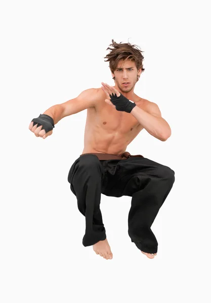 Jumping martial arts fighter — Stock Photo, Image