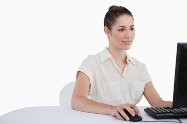 Businesswoman using a monitor — Stock Photo, Image