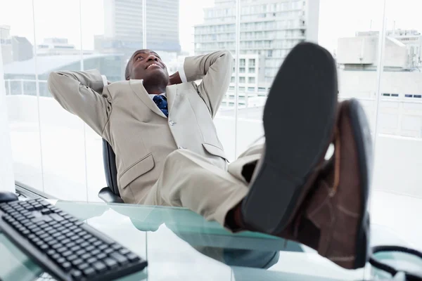 Happy businessman relaxing — Stock Photo, Image