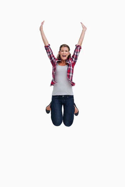 Portrait of a woman jumping — Stock Photo, Image