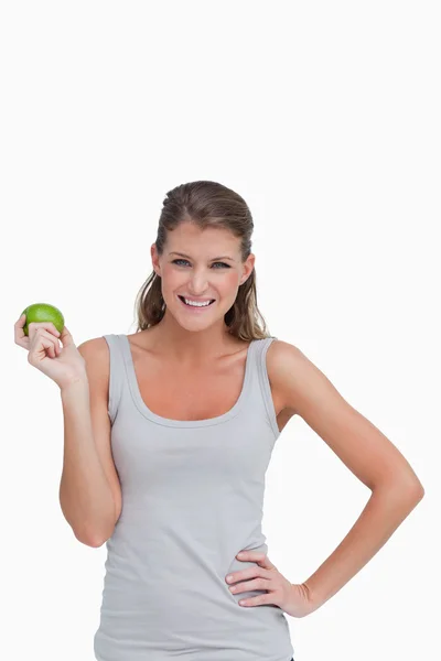 Portret kobiety trzyma jabłko — Zdjęcie stockowe