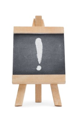 Chalkboard with an exclamation mark written on it clipart