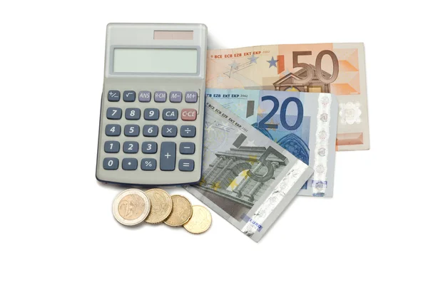Monedas y efectivo con calculadora de bolsillo — Foto de Stock
