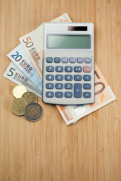 Calcolatrice di denaro e tasca — Foto Stock