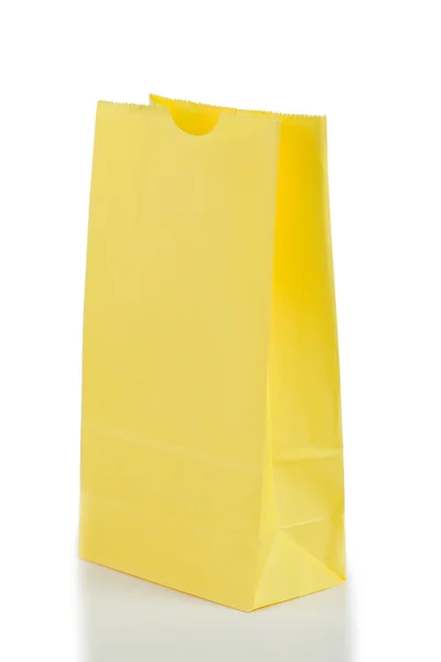 Žlutá papírový sáček — Stock fotografie