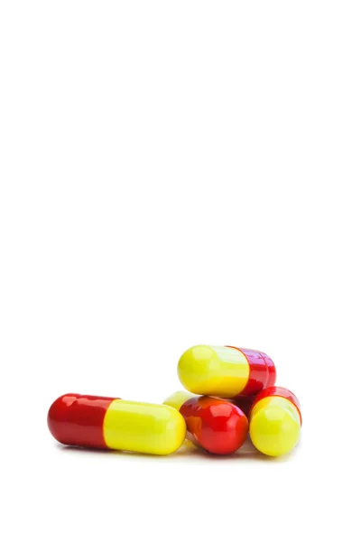 Желтое и красное лекарство — стоковое фото