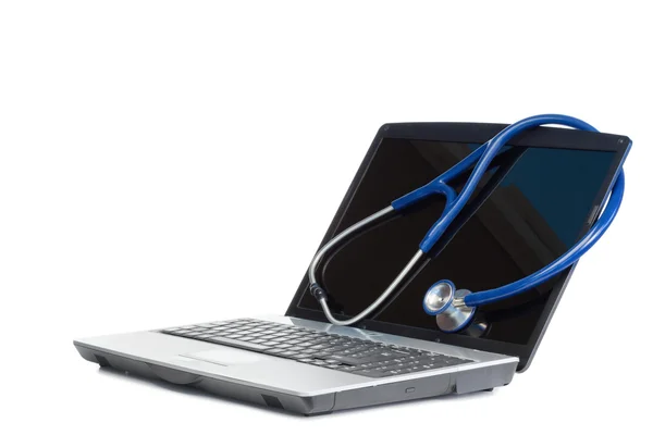 Stetoscopio angolato blu e laptop — Foto Stock