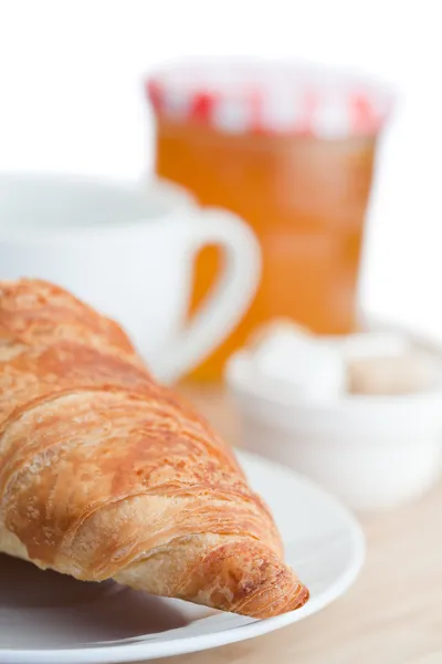 Ontbijt met koffie marmelade en croissants — Stockfoto