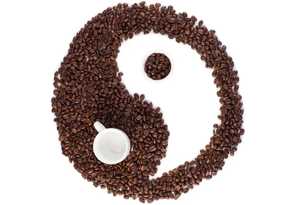 Símbolo marrón y blanco hecho de granos de café —  Fotos de Stock