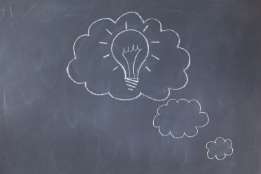 Cloud bubbles on a blackboard clipart