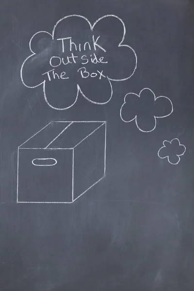 Пузырьки с посланием и коробкой, нарисованной на чернозем — стоковое фото