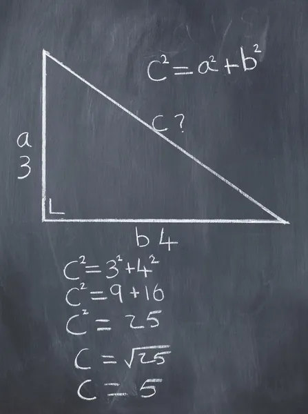 stock image Right triangle with pythagorean formula and calculations on a bl