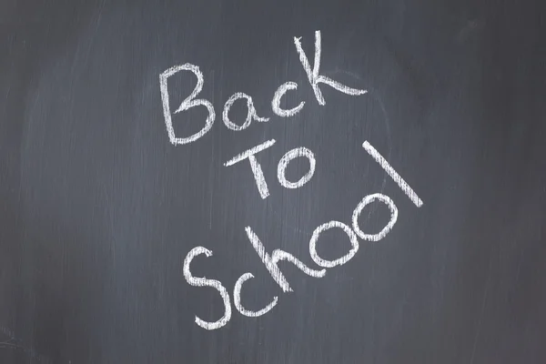 "重返学校"写上黑板 — 图库照片